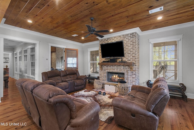213 Ironwood Plantation Blvd, Madison, MS 39110 - living area with ornamental molding, a ceiling fan, and a fireplace