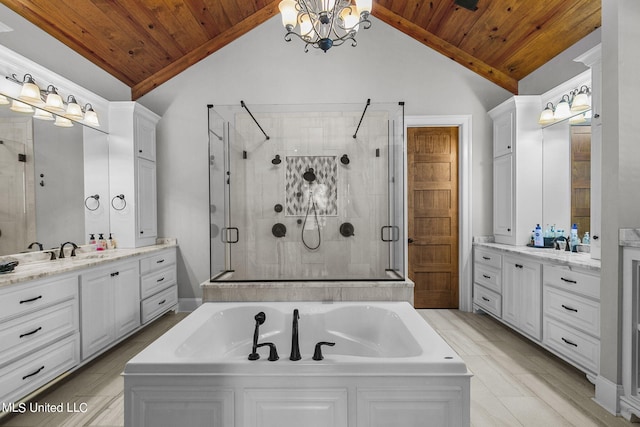 bathroom featuring vanity, wood ceiling, and independent shower and bath