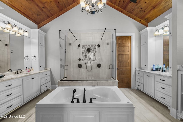 213 Ironwood Plantation Blvd, Madison, MS 39110 - bathroom featuring a sink, wood ceiling, a garden tub, and a stall shower
