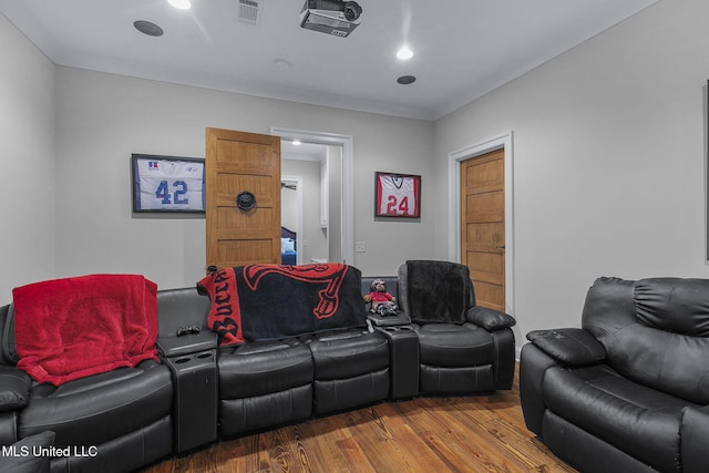 home theater featuring hardwood / wood-style floors