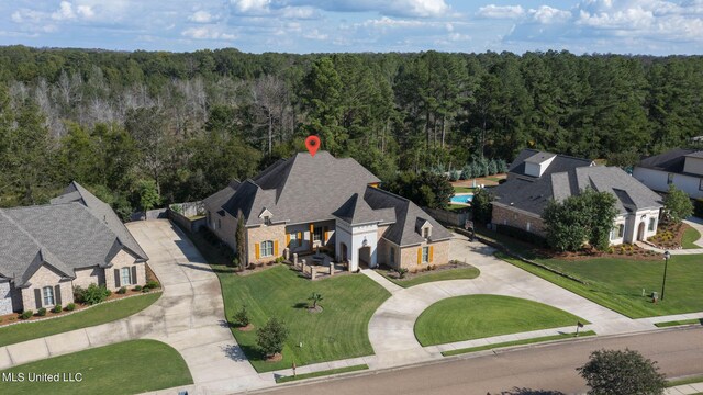 213 Ironwood Plantation Blvd, Madison, MS 39110 - aerial view with a forest view