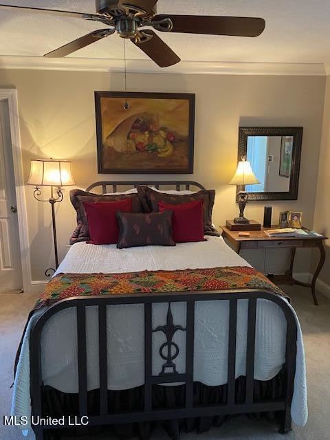 806 Viney Ridge Rd, Clarksdale, MS 38614 - bedroom featuring carpet, crown molding, a ceiling fan, and baseboards