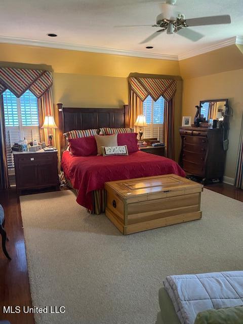 806 Viney Ridge Rd, Clarksdale, MS 38614 - bedroom featuring crown molding, wood finished floors, and a ceiling fan