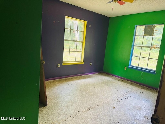 55 Amacker Rd, Poplarville, MS 39470 - spare room with a ceiling fan, a textured ceiling, carpet flooring, and baseboards