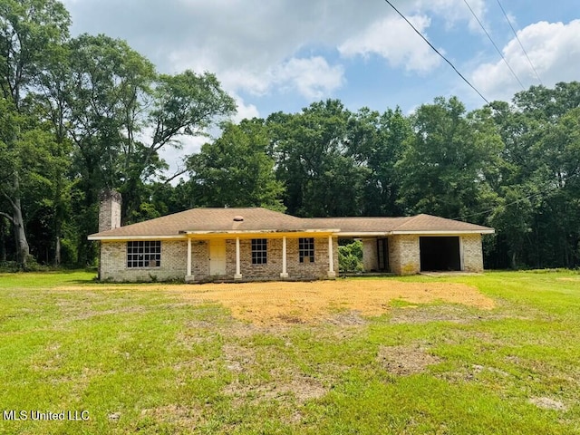 55 Amacker Rd, Poplarville, MS 39470 - ranch-style home with a chimney, a front lawn, and an attached garage