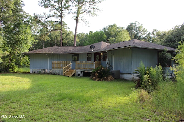 21481 Talmage Ln, Long Beach, MS 39560 - view of front of property with a front lawn and a wooden deck