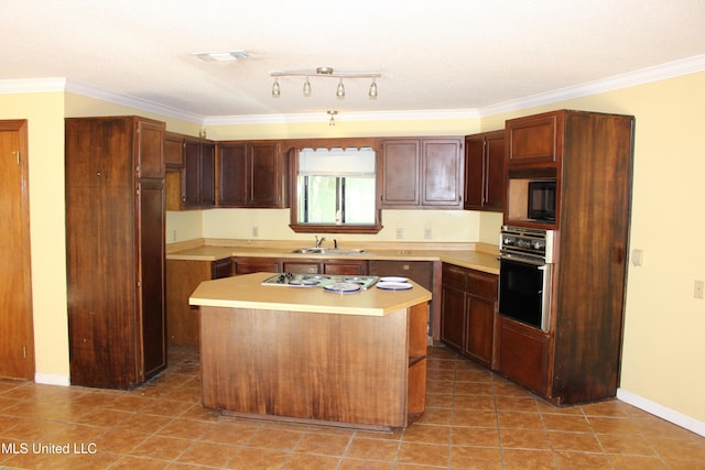 21481 Talmage Ln, Long Beach, MS 39560 - kitchen with black appliances, light countertops, a kitchen island, crown molding, and light tile patterned floors