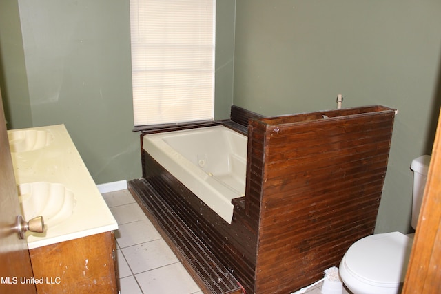 21481 Talmage Ln, Long Beach, MS 39560 - full bath featuring double vanity, a jetted tub, and tile patterned floors