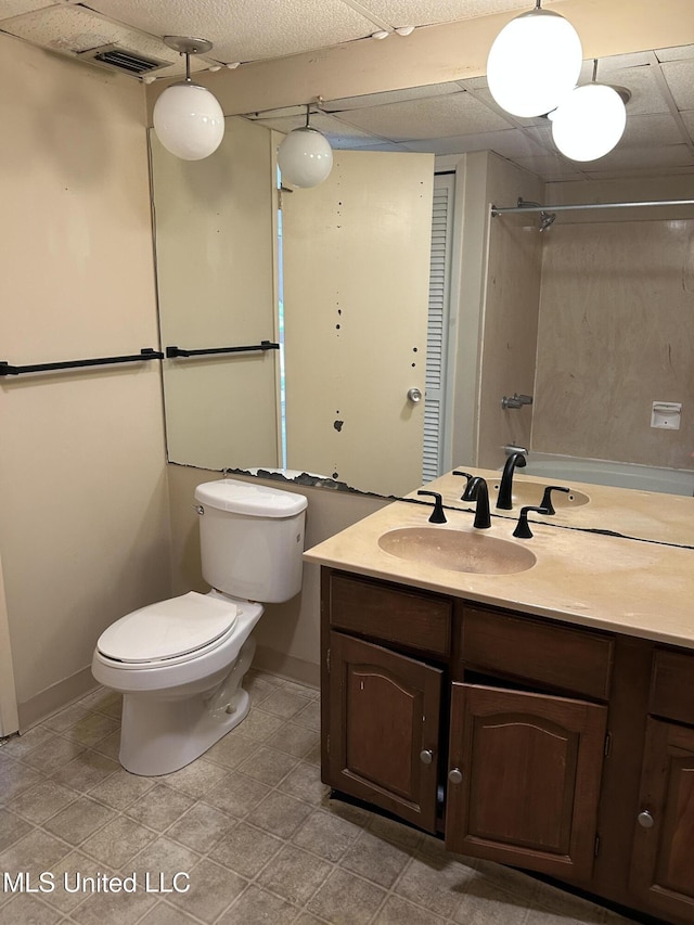 150 Lakeside Villa Unit J, Diamondhead, MS 39525 - bathroom with toilet, vanity, and baseboards