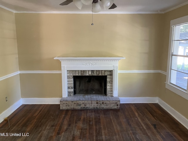 detailed view of wood finished floors, a ceiling fan, baseboards, ornamental molding, and a fireplace