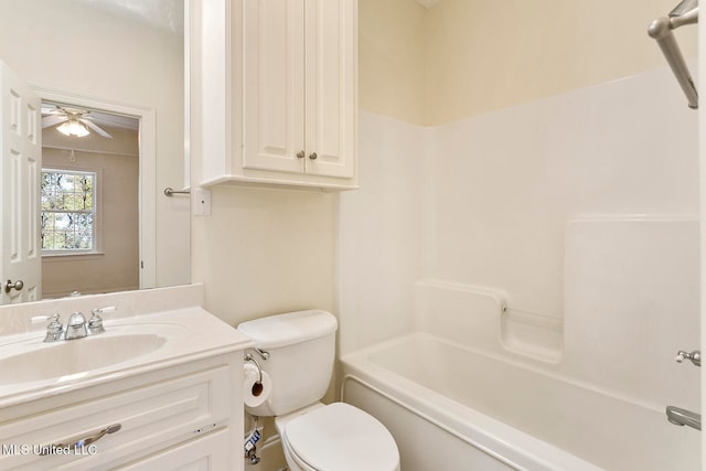 full bathroom with toilet, vanity, bathing tub / shower combination, and ceiling fan