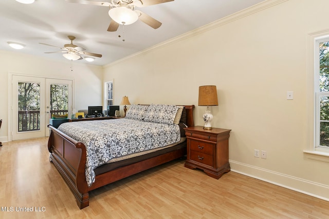 bedroom with light hardwood / wood-style flooring, multiple windows, access to exterior, and ceiling fan