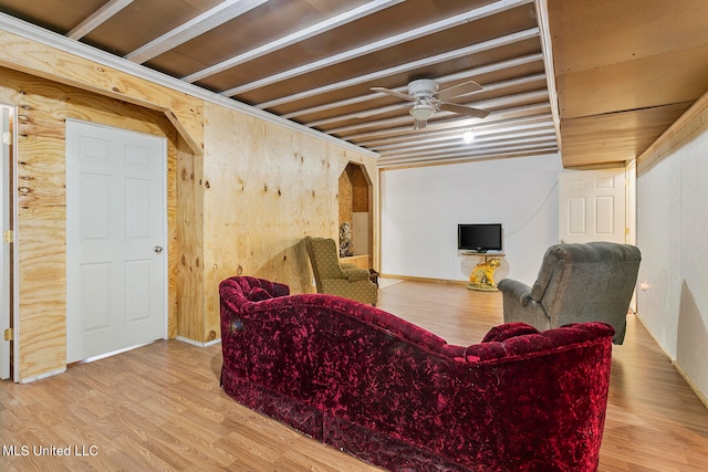 living room with light wood-type flooring and ceiling fan