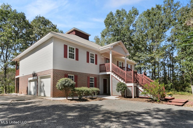 front facade with a garage