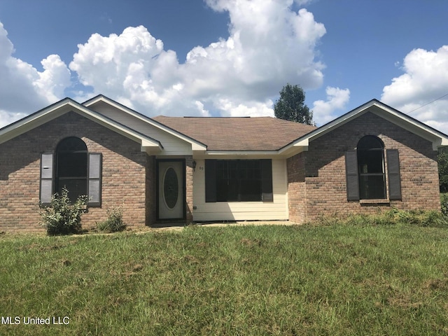 69 Wiley Ave, Durant, MS 39063 - single story home featuring brick siding and a front lawn