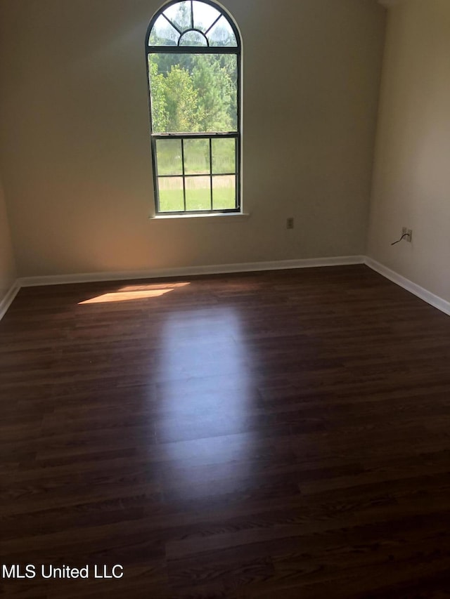 69 Wiley Ave, Durant, MS 39063 - unfurnished room with dark wood-style floors