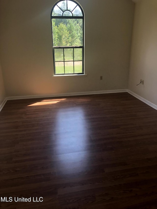 69 Wiley Ave, Durant, MS 39063 - unfurnished room featuring dark wood finished floors