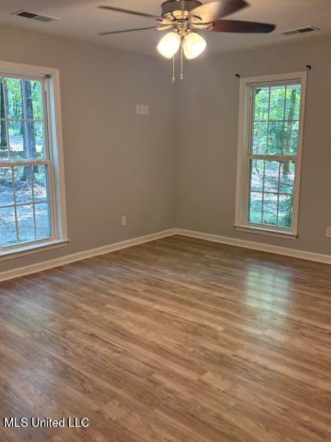 81 Hickory, Byhalia, MS 38611 - unfurnished room featuring wood finished floors and a ceiling fan
