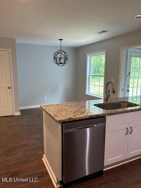 81 Hickory, Byhalia, MS 38611 - kitchen with dishwasher, light stone countertops, and plenty of natural light