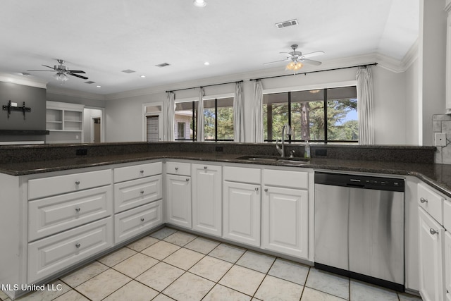415 Spike Rdg, Canton, MS 39046 - kitchen with stainless steel dishwasher, ceiling fan, a sink, white cabinetry, and ornamental molding