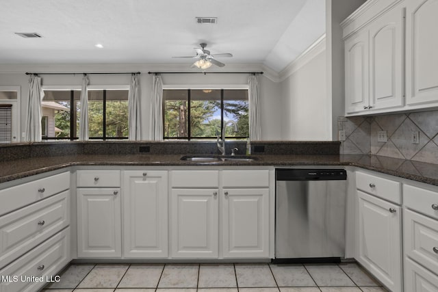 415 Spike Rdg, Canton, MS 39046 - kitchen with stainless steel dishwasher, a sink, ceiling fan, healthy amount of natural light, and ornamental molding