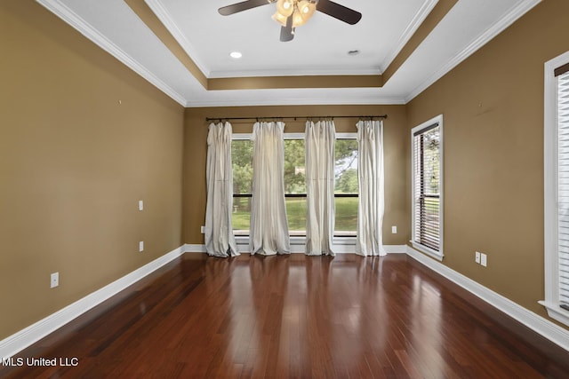415 Spike Rdg, Canton, MS 39046 - unfurnished room with a tray ceiling, ceiling fan, baseboards, wood finished floors, and crown molding