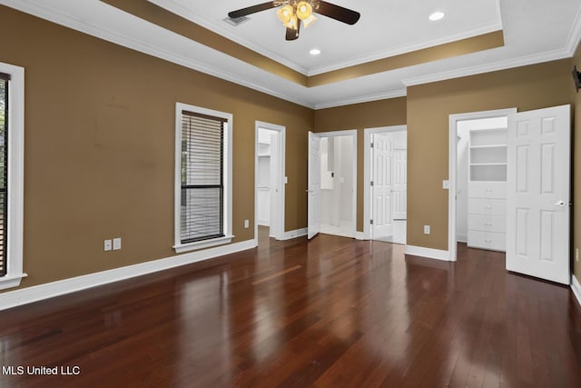 415 Spike Rdg, Canton, MS 39046 - unfurnished bedroom with a raised ceiling, wood finished floors, baseboards, crown molding, and recessed lighting