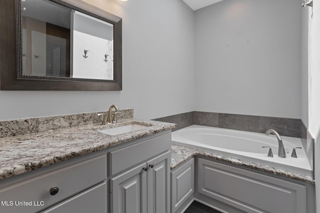415 Spike Rdg, Canton, MS 39046 - bathroom featuring vanity and a garden tub