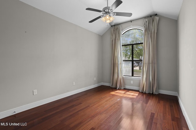 415 Spike Rdg, Canton, MS 39046 - empty room with lofted ceiling, a ceiling fan, wood finished floors, and baseboards