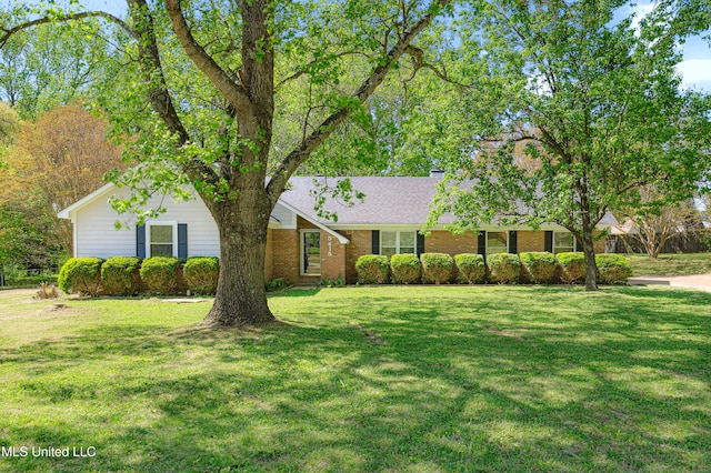 5415 Sollie Cv, Horn Lake, MS 38637 - ranch-style house featuring brick siding and a front lawn