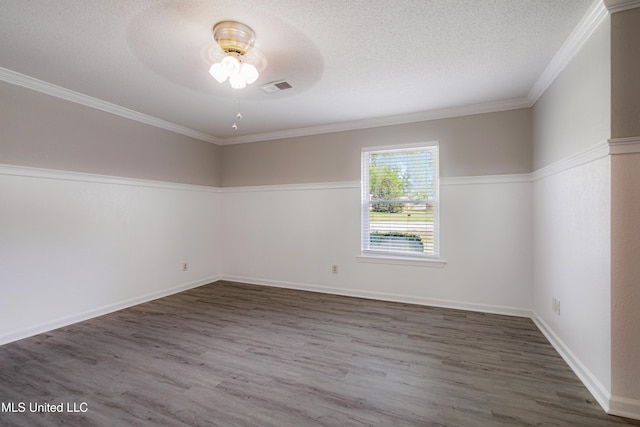 5415 Sollie Cv, Horn Lake, MS 38637 - empty room with wood finished floors, visible vents, crown molding, a textured ceiling, and ceiling fan