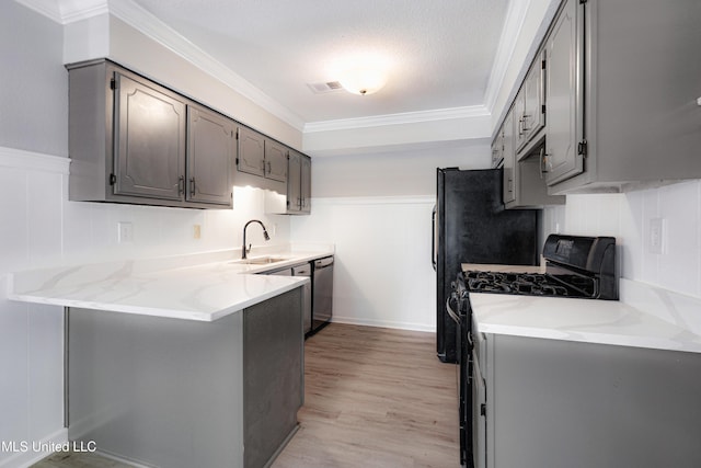 5415 Sollie Cv, Horn Lake, MS 38637 - kitchen with a peninsula, stainless steel dishwasher, a sink, gray cabinetry, and crown molding