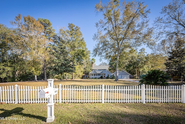 view of front of property with a front lawn