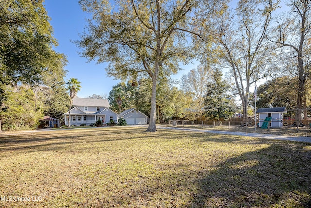 view of yard featuring a garage