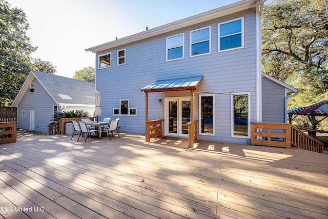 wooden terrace featuring french doors