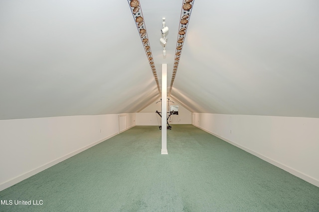 bonus room featuring carpet floors and lofted ceiling