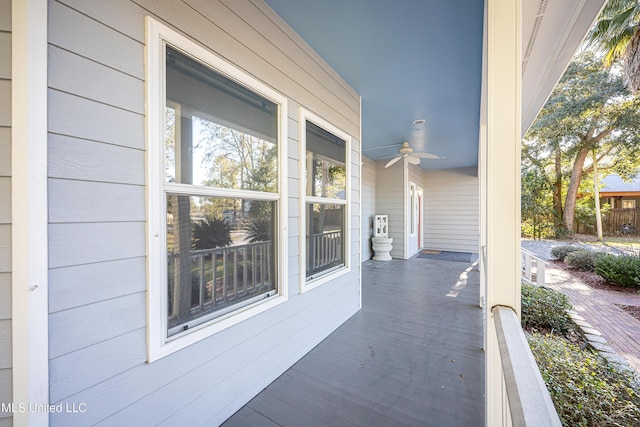 view of patio featuring ceiling fan and covered porch