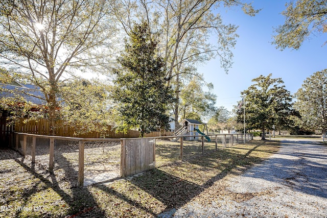 view of yard with a playground