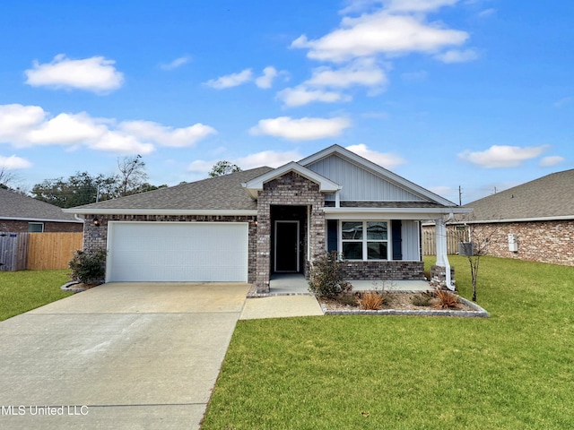 view of front of house with a garage and a front lawn