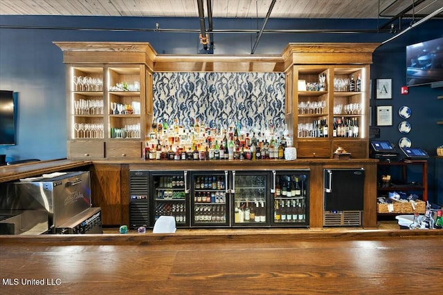 bar featuring wine cooler and wood ceiling