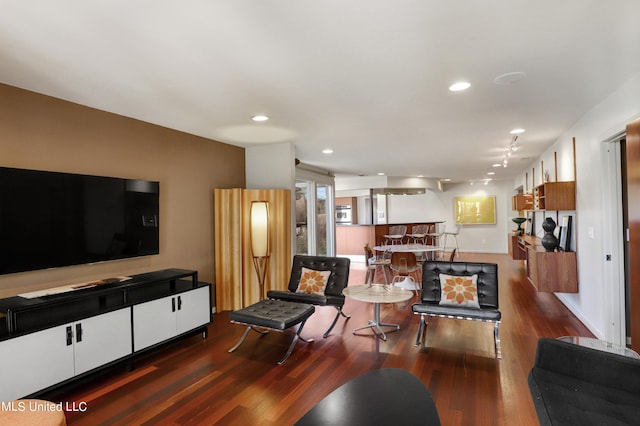 living room with dark hardwood / wood-style floors