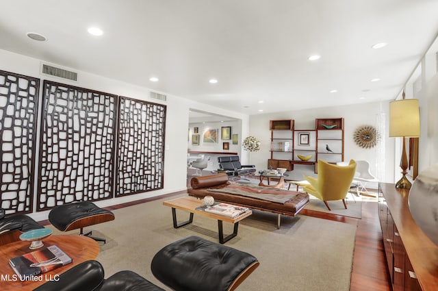 living room with dark hardwood / wood-style floors