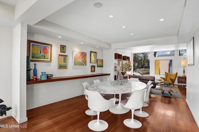 dining area featuring hardwood / wood-style flooring