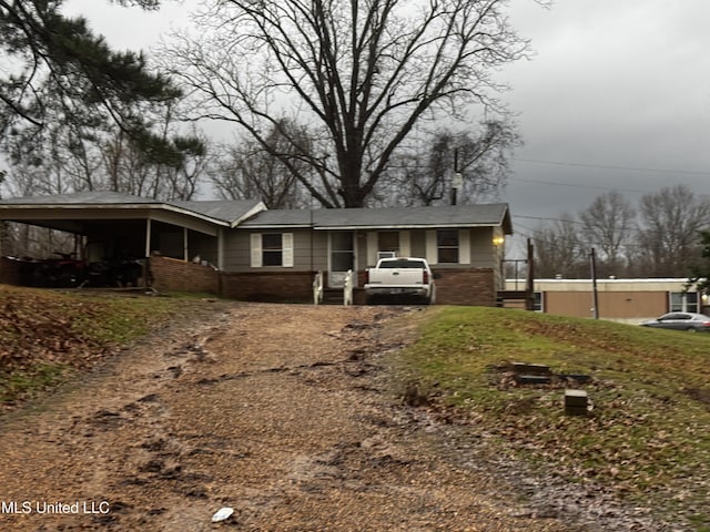 178 Bobo Rd, Lorman, MS 39096 - view of front of home featuring a carport and brick siding