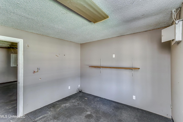 empty room with a textured ceiling