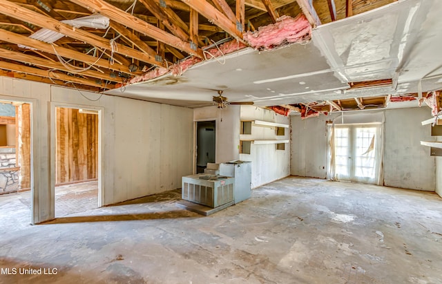 misc room featuring unfinished concrete flooring