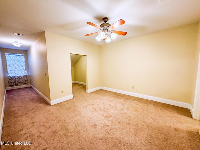 unfurnished room featuring carpet flooring and ceiling fan