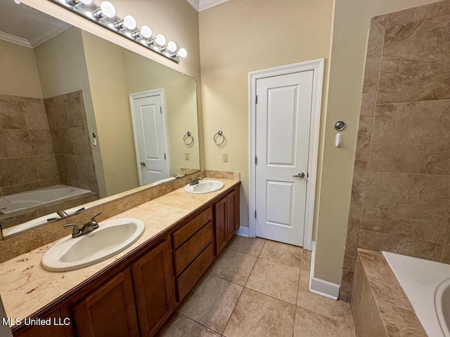 bathroom with tiled bath, vanity, ornamental molding, and tile patterned flooring