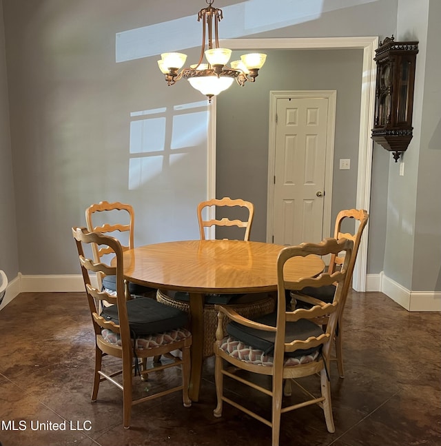 140 Whisper Lake Blvd, Madison, MS 39110 - dining room featuring baseboards and a chandelier