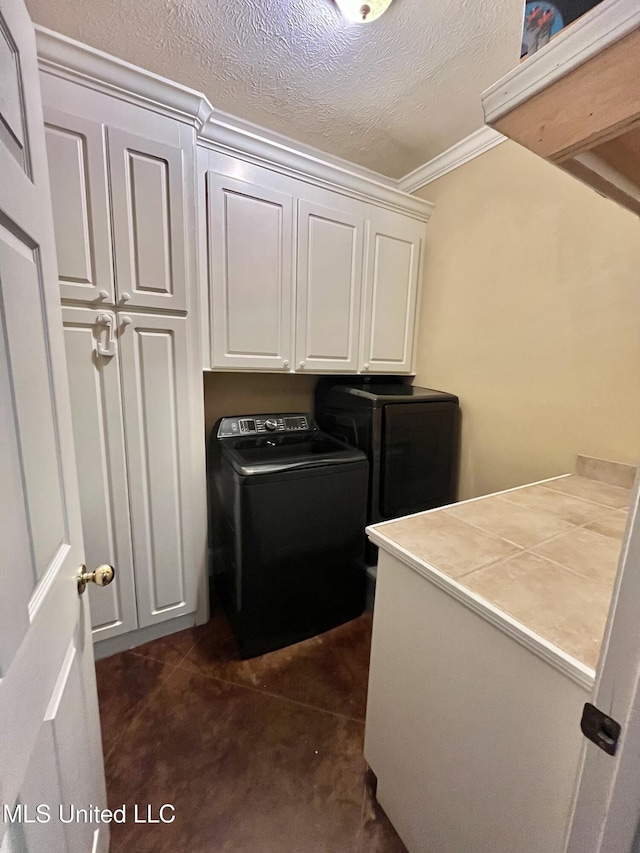 140 Whisper Lake Blvd, Madison, MS 39110 - laundry room featuring cabinet space, crown molding, and a textured ceiling